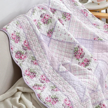 Floral Print Cotton Quilt Bedspread on The Bed