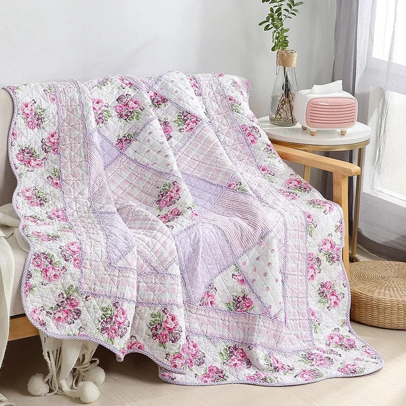 Floral Print Cotton Quilt Bedspread on The Bed