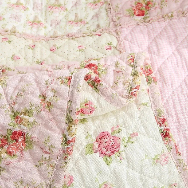 Floral Print Cotton Quilt Bedspread on The Bed