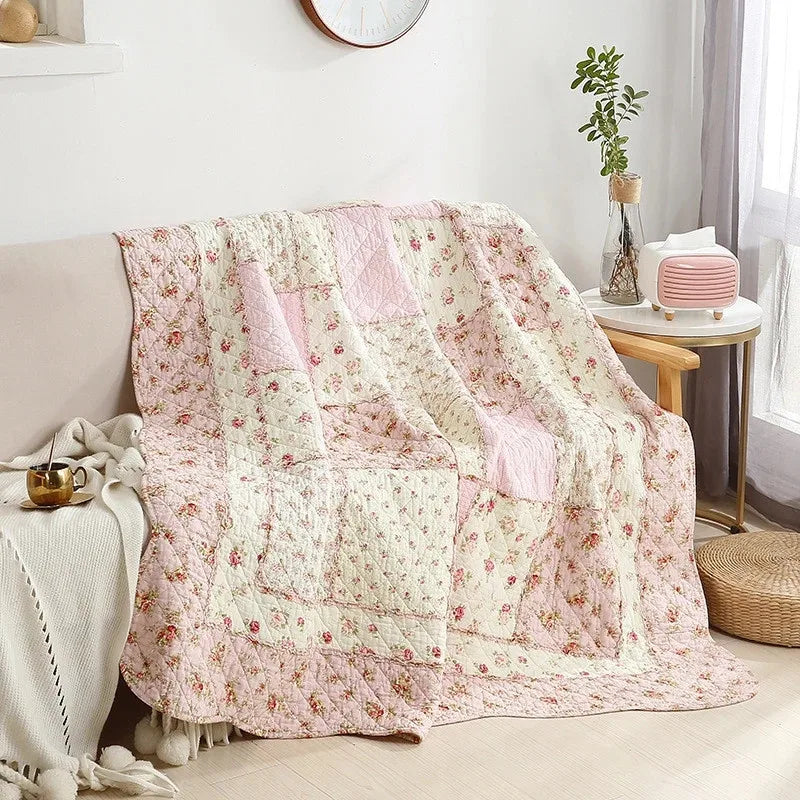 Floral Print Cotton Quilt Bedspread on The Bed