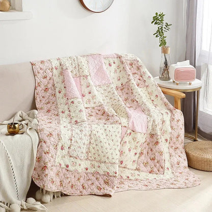 Floral Print Cotton Quilt Bedspread on The Bed