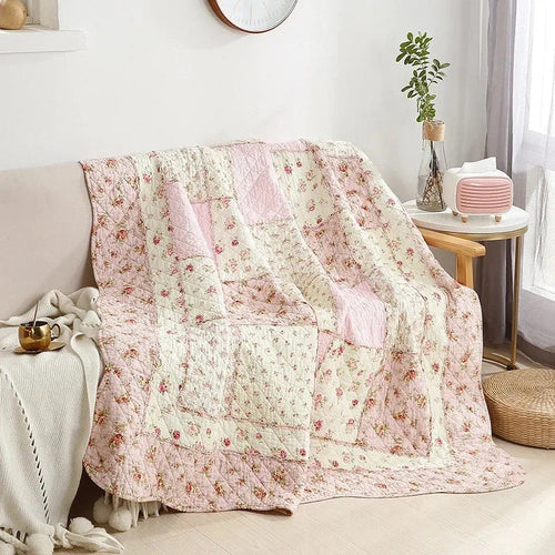 Floral Print Cotton Quilt Bedspread on The Bed