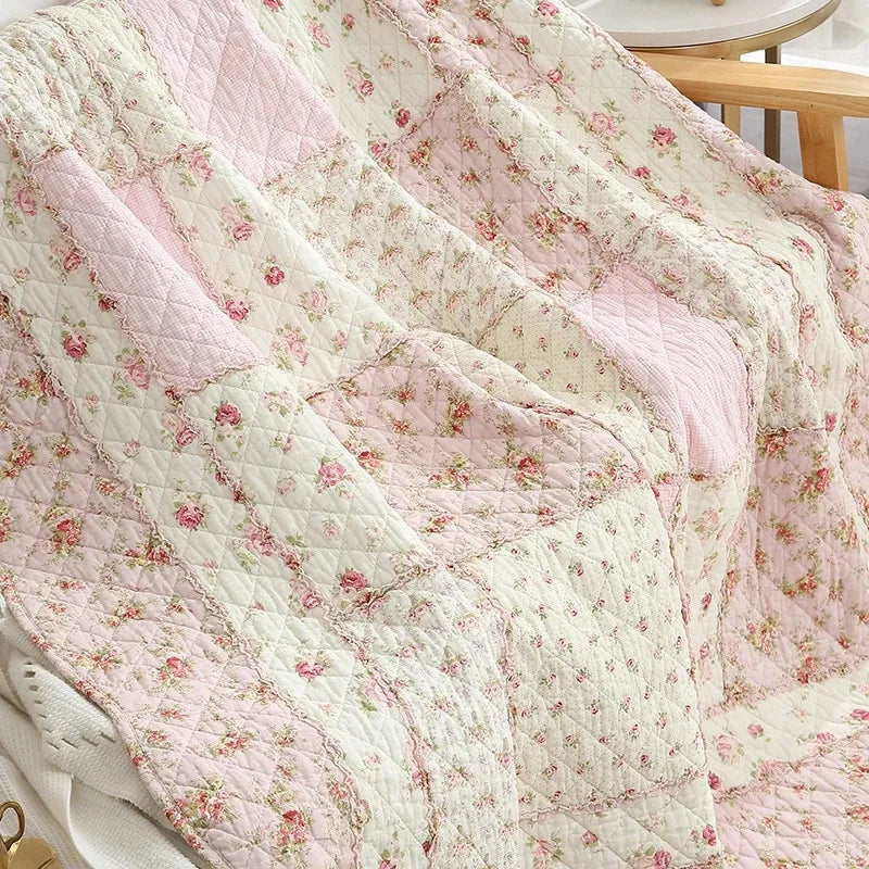 Floral Print Cotton Quilt Bedspread on The Bed